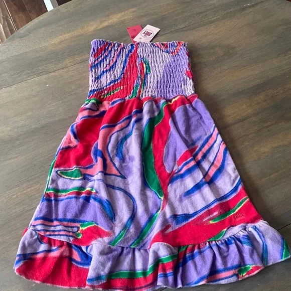 Juicy couture swim coverup. Brand new. Runs small. More like an xs or xxs